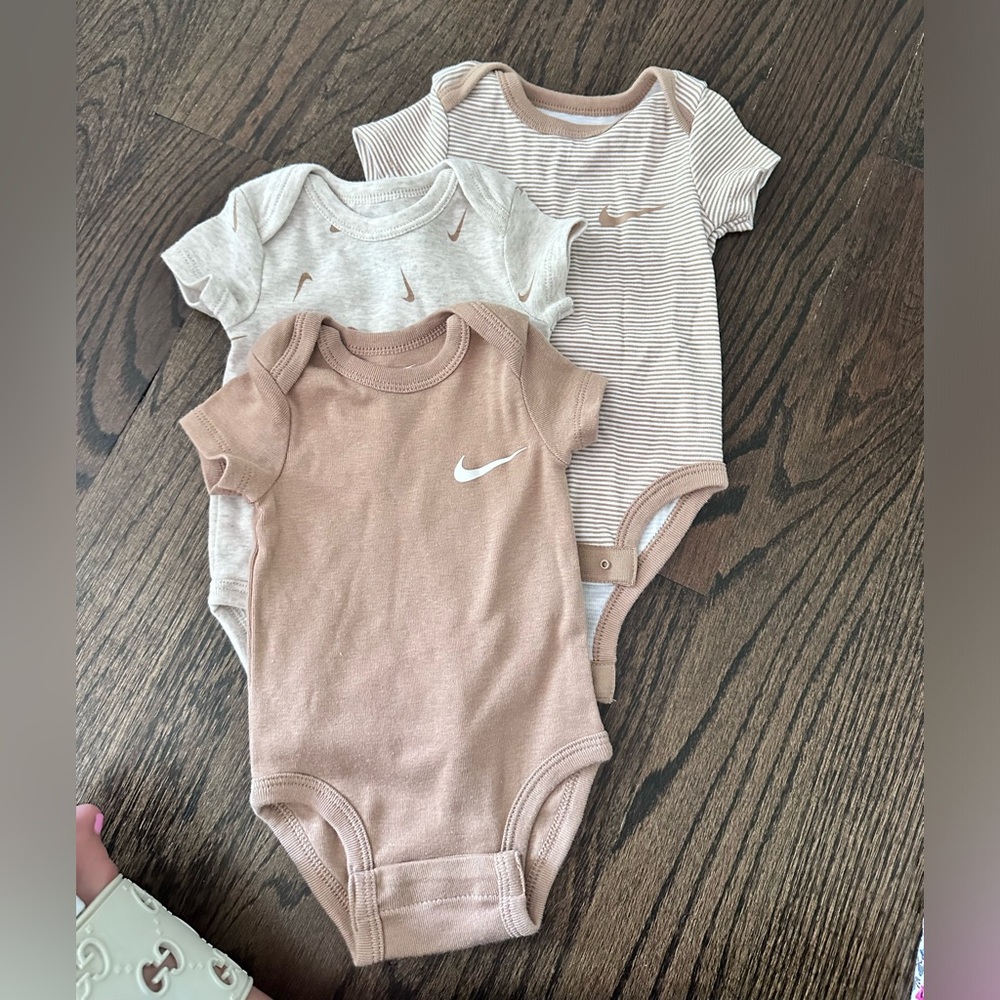THREE Nike onesies 3M
